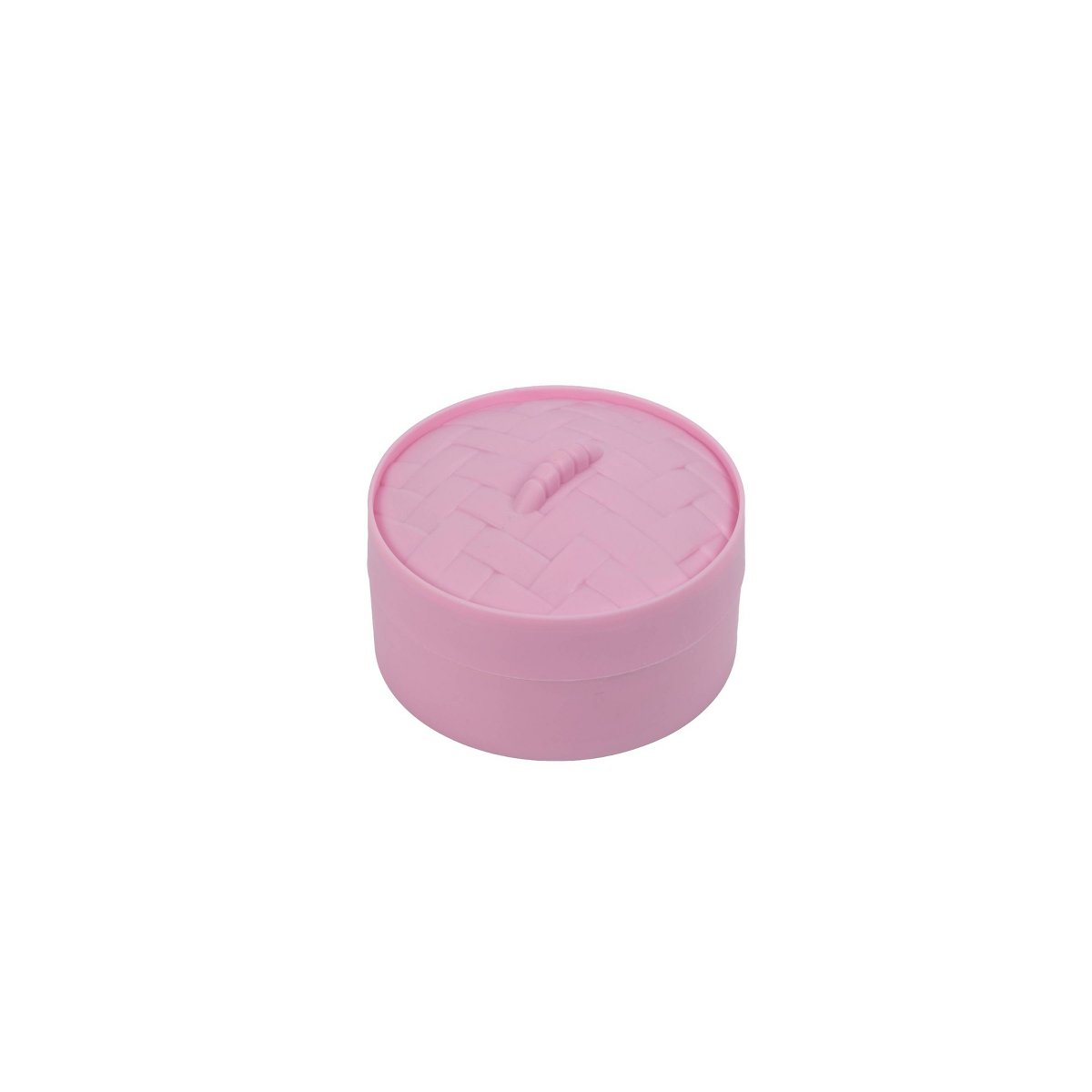 Caja vaporera rosa cerrada con tapa de patrón de ratán moldeado en silicona — el formato sellado en el que llega el Mystery Dumpling antes del unboxing.